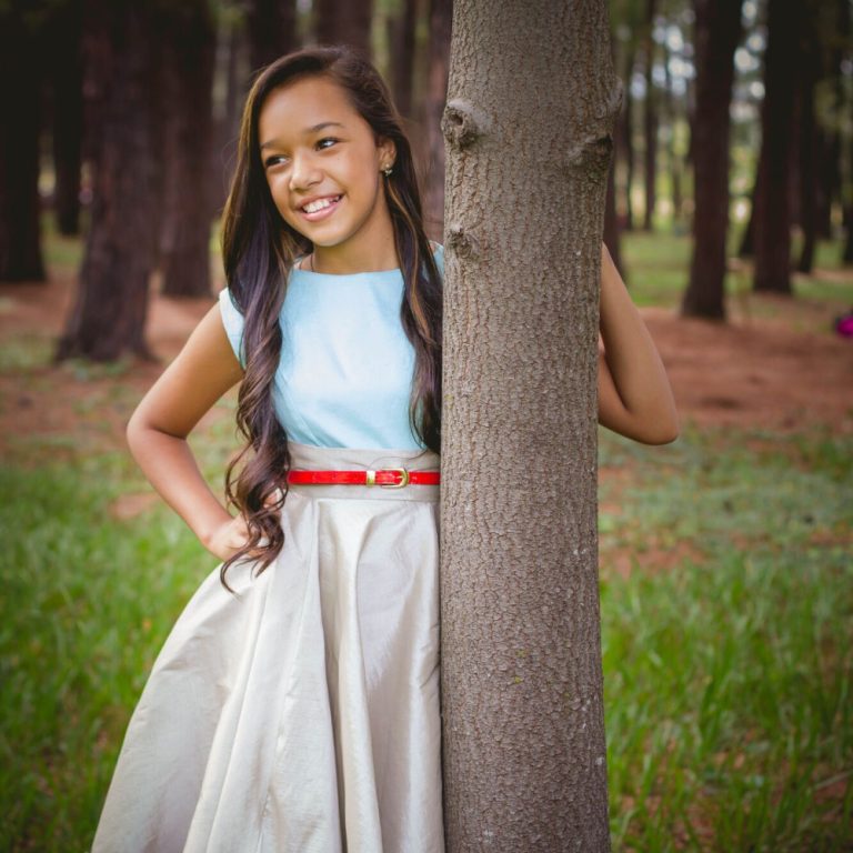 Young Girl in Modest Skirt Posing with Tree | Why Modesty Still Matters | Public Square Magazine | Why Modesty is Important | What Happened to Modesty | Why is Modesty Important