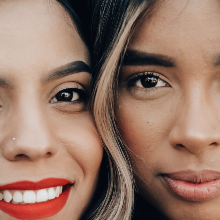 Close up of Two Women's Smiling Eyes Side-by-Side | Envy, The Wall Between Women | Public Square Magazine | The Wall Women | Between Women | Covet vs Envy