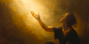 A person kneeling in prayer as light reaches towards them representing Jesus Christ, illustrating the connection through temple ordinances.