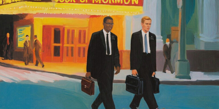 Two missionaries walk past a theater in New York, evoking the tension between service and the Book of Mormon musical.