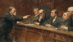 An elected official scolds a colleague in a government chamber, reflecting breakdowns in political leadership and dignity.