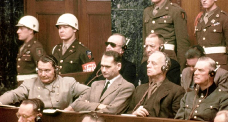 01 Jan 1946, Nuremberg, Germany --- The defendants at the Nuremberg Nazi trials.  Pictured in the front row are: Hermann Goering, Rudolf Hess,  Joachim Von Ribbentrop, Wilhelm Keitel and Ernst Kaltenbrunner.  In the back row are: Karl Doenitz, Erich Raeder, Baldur von Schirach, and Fritz Sauckel. --- Image by © Bettmann/CORBIS