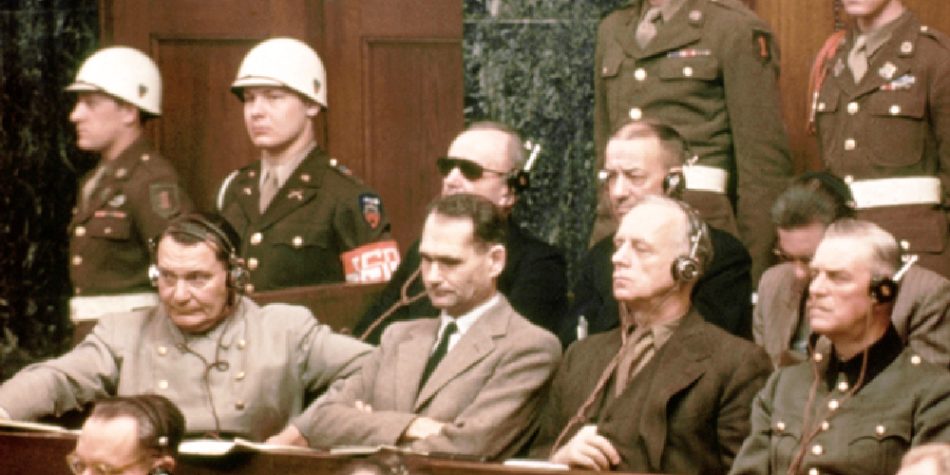 01 Jan 1946, Nuremberg, Germany --- The defendants at the Nuremberg Nazi trials.  Pictured in the front row are: Hermann Goering, Rudolf Hess,  Joachim Von Ribbentrop, Wilhelm Keitel and Ernst Kaltenbrunner.  In the back row are: Karl Doenitz, Erich Raeder, Baldur von Schirach, and Fritz Sauckel. --- Image by © Bettmann/CORBIS