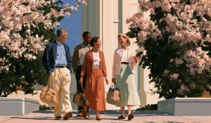 Two men and two women share a friendly conversation outside a temple where they seek temple blessings.