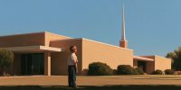 A child looks up at a sunlit chapel spire, showing how church steeples direct attention toward heaven.