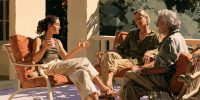 Three generations share a conversation, illustrating women’s agency and the wisdom to choose well.